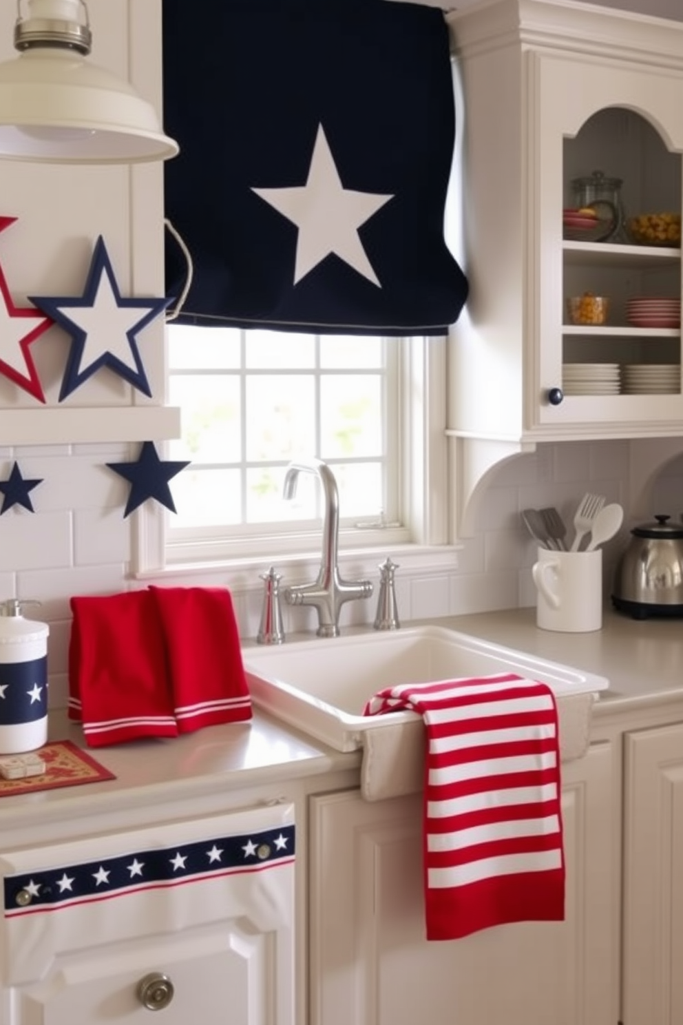 A patriotic themed kitchen featuring dish towels and linens in red white and blue colors. The decor includes star and stripe patterns with accents of white and navy blue throughout the space.