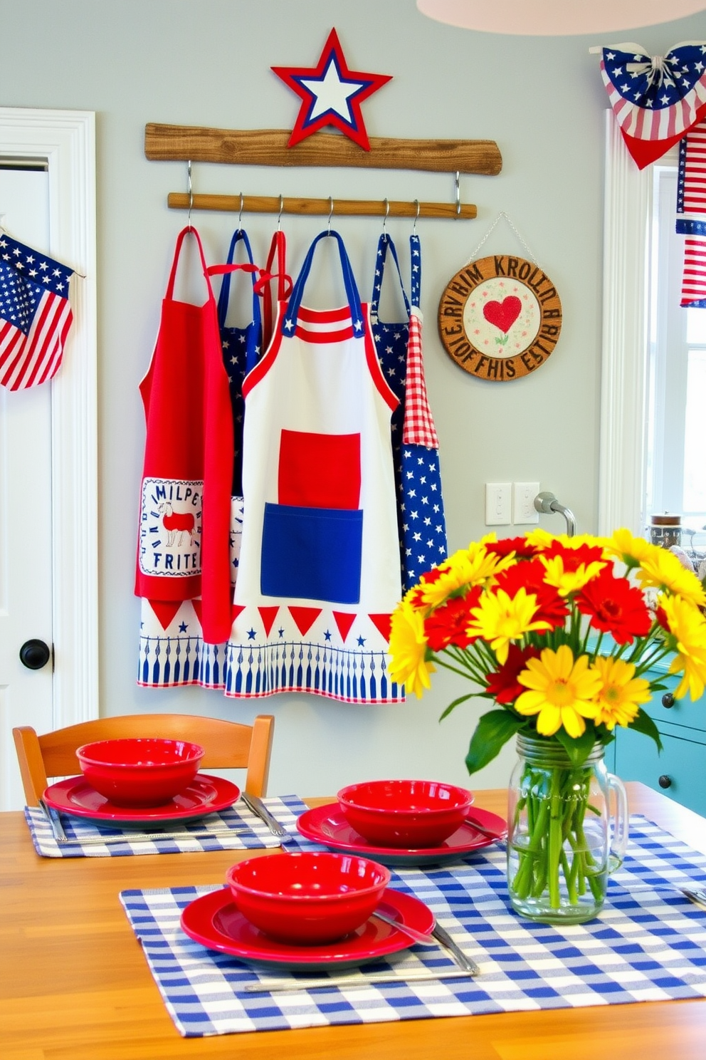 Create a festive kitchen setting decorated for Memorial Day. The focal point is a charming display of red white and blue themed aprons hanging on a rustic wooden rack. The kitchen features a cheerful table set with a blue and white checkered tablecloth and red dishes. Brightly colored flowers in a vase add a touch of seasonal spirit to the countertop.