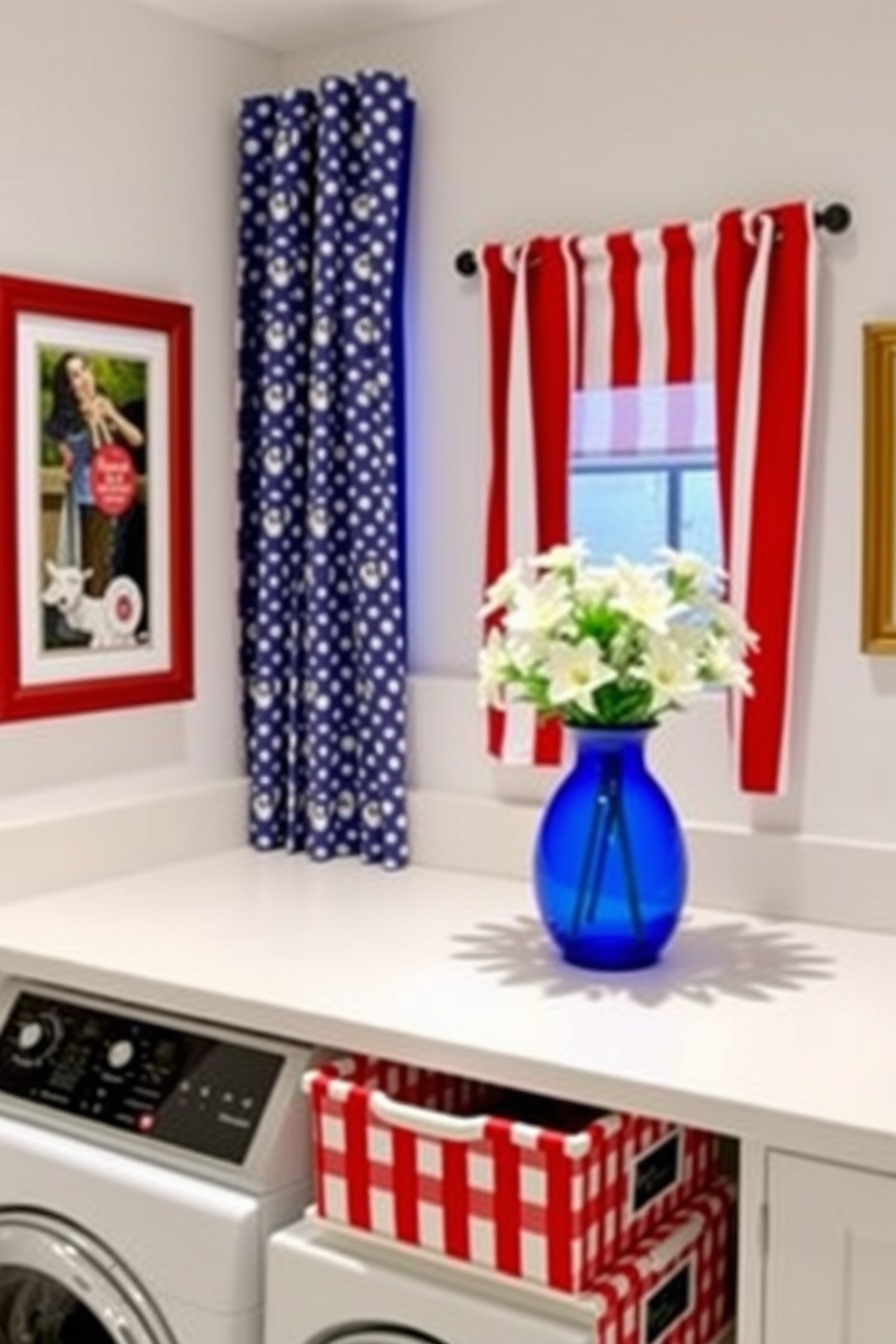 A bright and cheerful laundry room decorated with patriotic red white and blue accents. The walls are painted in a soft white shade with red and blue decorative elements such as framed artwork and patterned curtains. A spacious countertop is adorned with a vibrant blue vase filled with fresh white flowers. Red and white striped baskets are neatly arranged for laundry storage, adding a festive touch to the space.