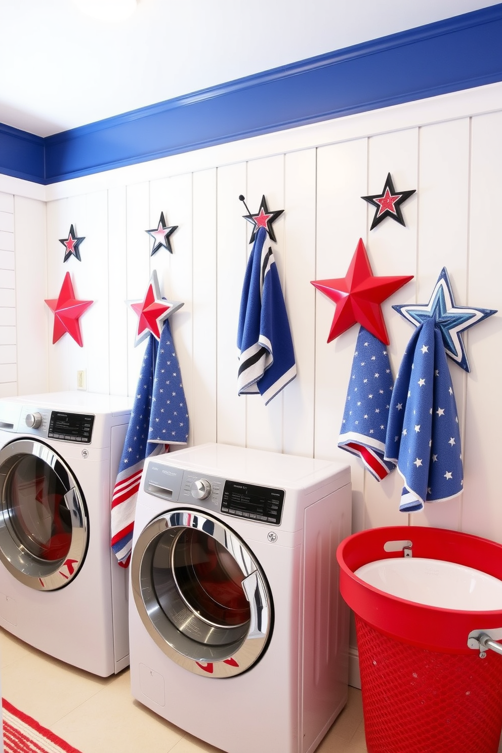 A bright and cheerful laundry room features star shaped wall hooks elegantly arranged to hold colorful towels. The walls are painted in a crisp white, complemented by vibrant accents in red and blue to celebrate Memorial Day.