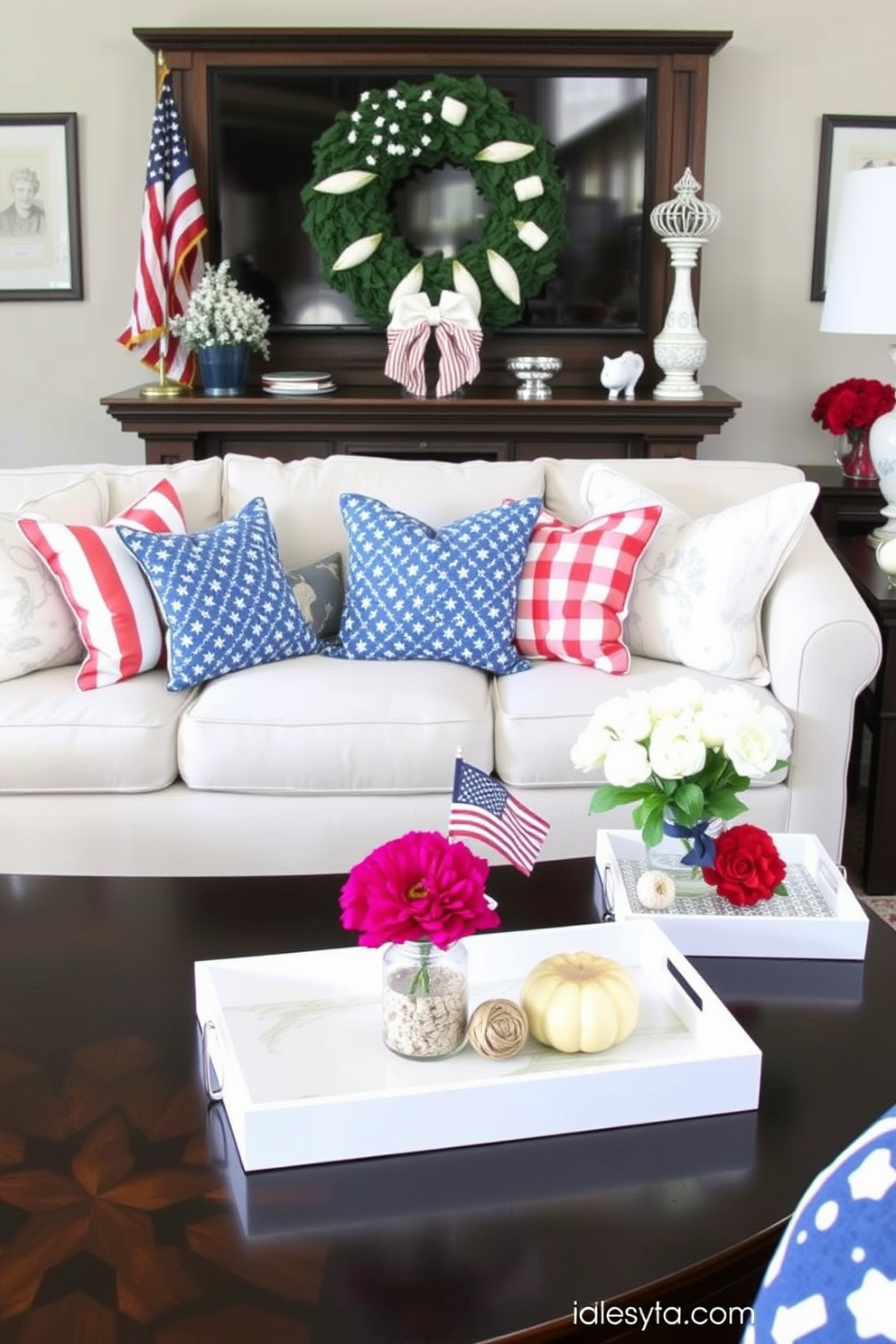 Create a cozy living room setting that features seasonal decorative trays on various tables. Incorporate red white and blue colors to celebrate Memorial Day with themed accents and festive decorations.