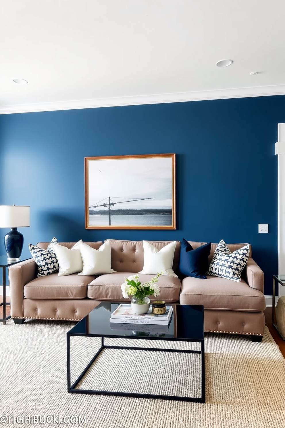 Accent wall painted in blue. The living room features a cozy sectional sofa adorned with white and navy throw pillows, complemented by a sleek coffee table.