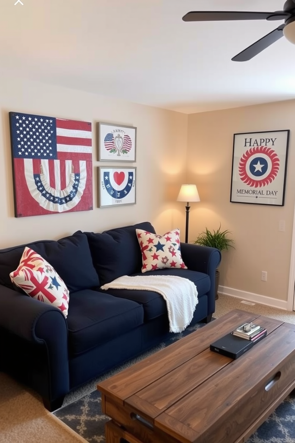 A cozy small living room adorned with patriotic themed wall art prints celebrating Memorial Day. The walls are painted in a soft beige, and a comfortable navy blue sofa is positioned against one wall, complemented by a rustic wooden coffee table.