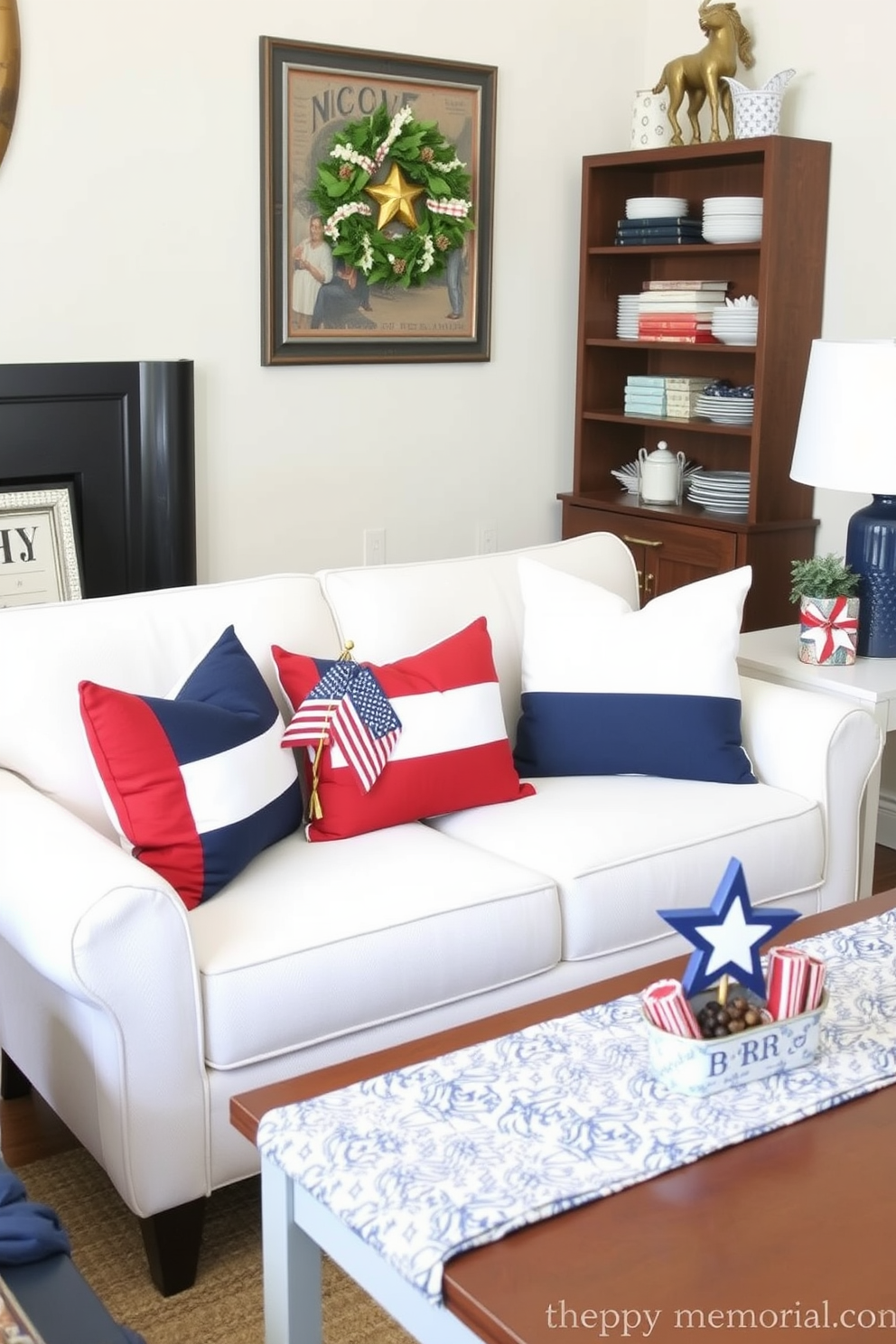 Create a cozy living area featuring red white and blue throw pillows arranged on a compact sofa. Incorporate small decorative elements that celebrate Memorial Day, such as a miniature flag and a star-themed centerpiece on a side table.