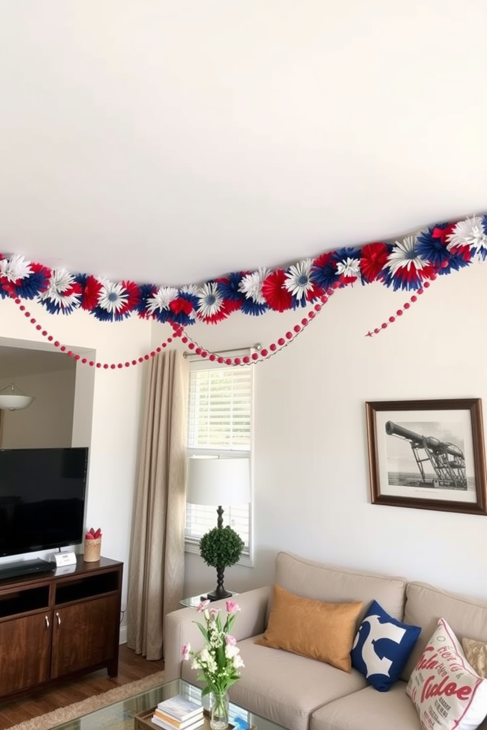 A vibrant colorful garland drapes elegantly from the ceiling, adding a festive touch to the room. The garland features an array of red, white, and blue decorations that celebrate Memorial Day while enhancing the overall ambiance of the space. In a small living area, the garland is strategically placed to draw the eye upward, creating an illusion of height. The decor is complemented by minimalist furnishings that maintain an open feel while celebrating the holiday spirit.