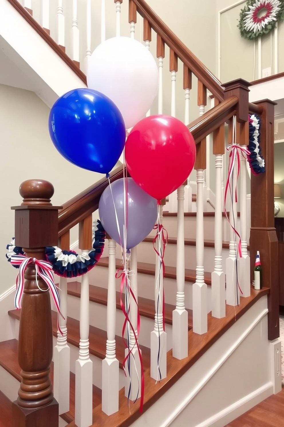 A festive staircase adorned with colorful balloons tied to the banister creates a cheerful atmosphere for Memorial Day celebrations. The balloons feature a mix of red, white, and blue hues, adding a vibrant touch to the elegant wooden staircase.