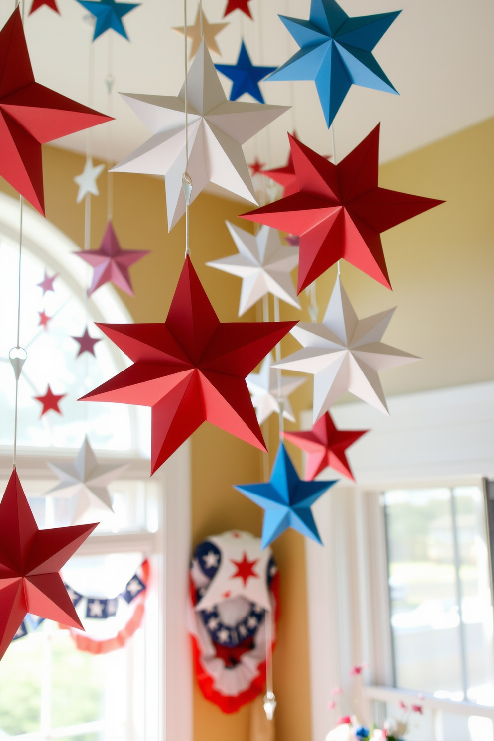 Hanging paper stars from the ceiling create a whimsical and festive atmosphere. The stars are crafted in various sizes and colors, adding depth and a playful touch to the room. For Memorial Day window decorating ideas, consider using red, white, and blue accents. Patriotic bunting and floral arrangements in these colors can enhance the celebration while bringing a festive spirit indoors.