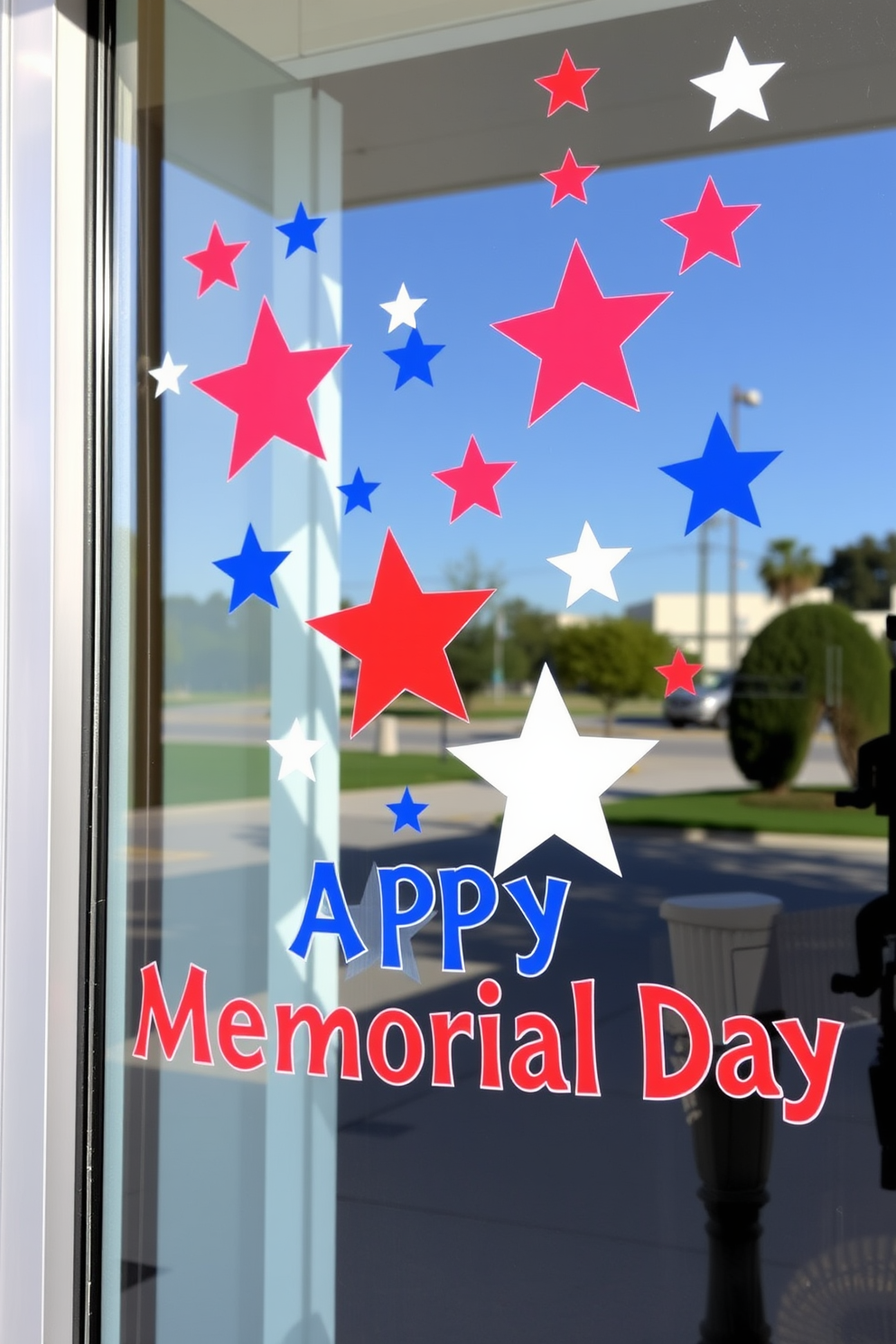 A festive window display featuring stars and stripes window clings in vibrant red, white, and blue. The clings are arranged in a playful pattern, celebrating Memorial Day with an inviting and patriotic atmosphere.