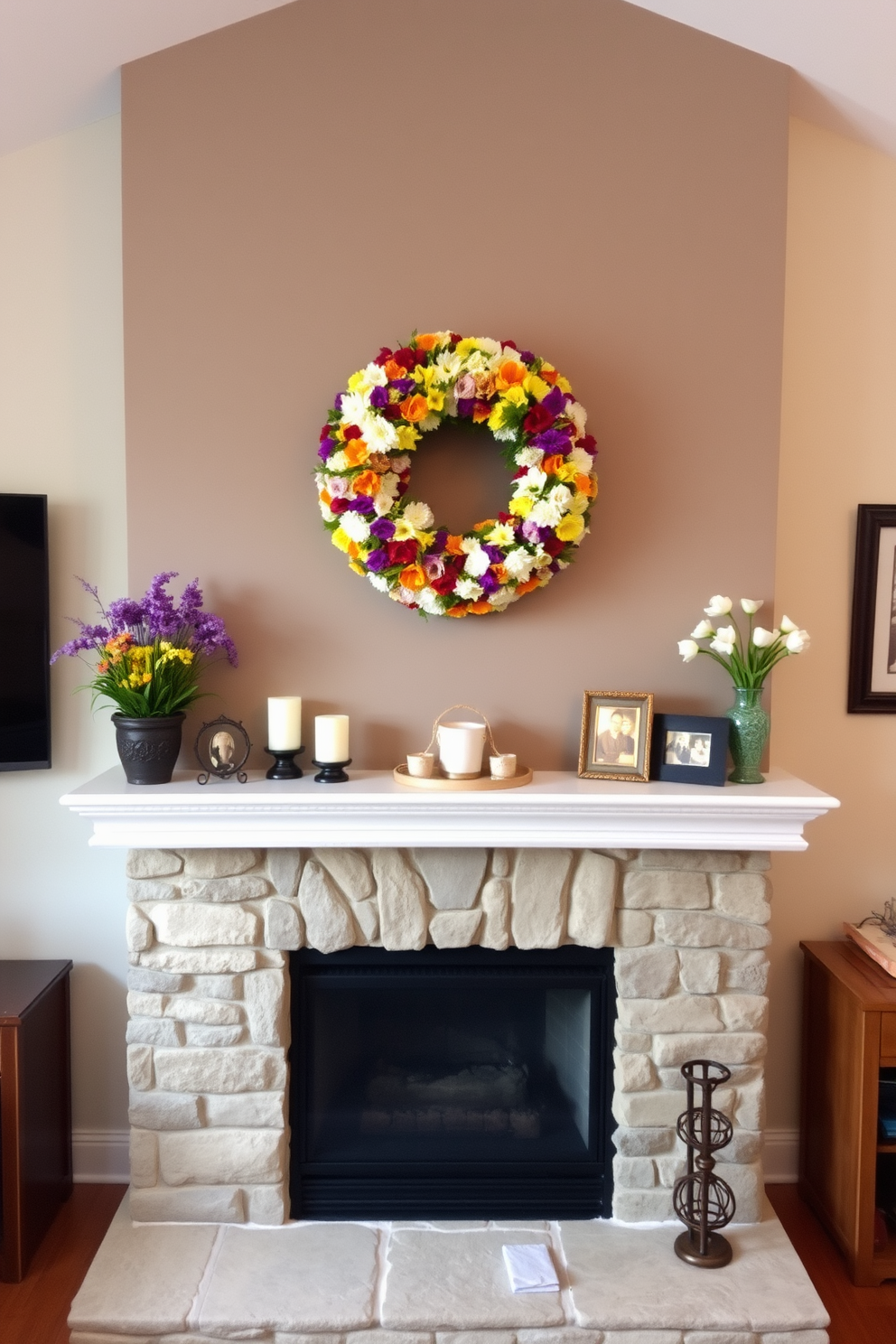 A cozy living room features a charming fireplace adorned with a beautiful floral wreath. The wreath is composed of vibrant spring flowers in various colors, creating a cheerful focal point above the mantel. The fireplace itself is surrounded by a rustic stone facade, adding warmth to the space. On the mantel, decorative items like candles and framed photos complement the seasonal decor, enhancing the inviting atmosphere.