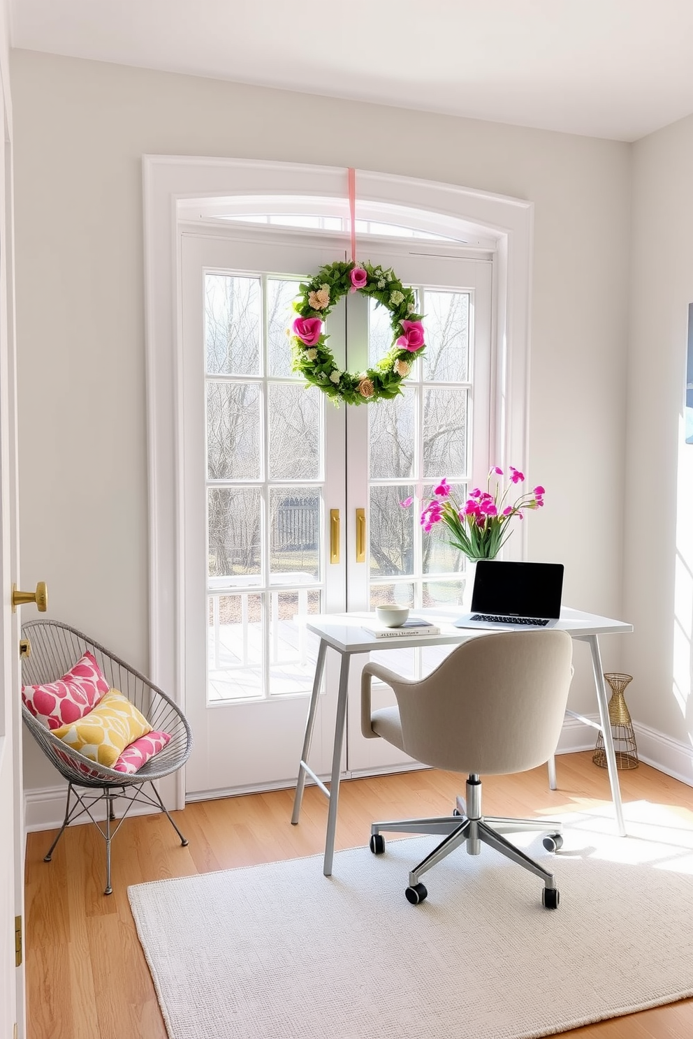 A bright and airy home office featuring a large window that lets in natural light. The walls are painted in a soft pastel hue, and a stylish desk sits in front of the window, adorned with fresh flowers and a laptop. A spring-themed wreath hangs beautifully on the door, made of vibrant flowers and greenery. The office is decorated with cheerful accents like colorful cushions on a cozy chair and a light rug that adds warmth to the space.