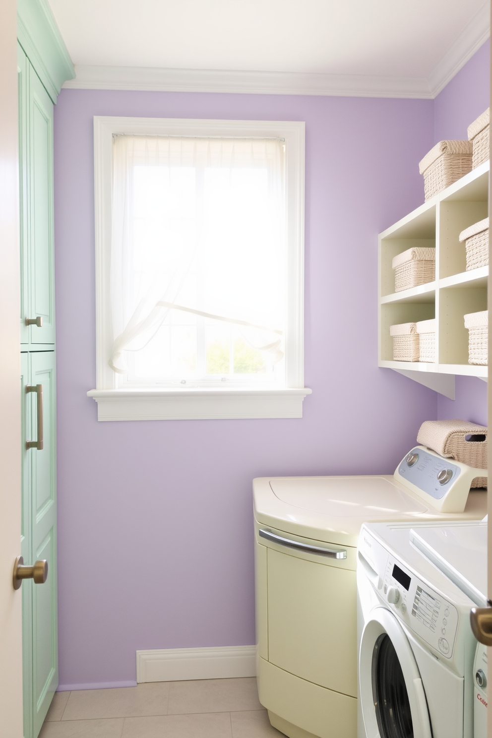 A bright and airy laundry room filled with pastel color palettes. The walls are painted in soft lavender, complemented by mint green cabinetry and a pale yellow washer and dryer set. A large window lets in natural light, adorned with sheer white curtains that flutter gently. Decorative baskets in coordinating pastel shades are neatly arranged on open shelves, adding both style and functionality.