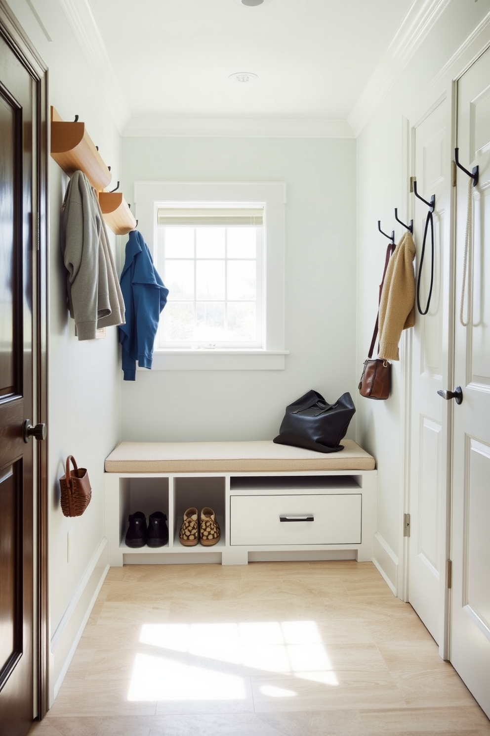 A welcoming mudroom filled with natural light. There is a stylish bench with storage underneath, ideal for keeping shoes and bags organized. The walls are painted in a soft pastel color, creating a fresh and airy atmosphere. Hooks are mounted on the wall for hanging coats and accessories, adding functionality to the space.