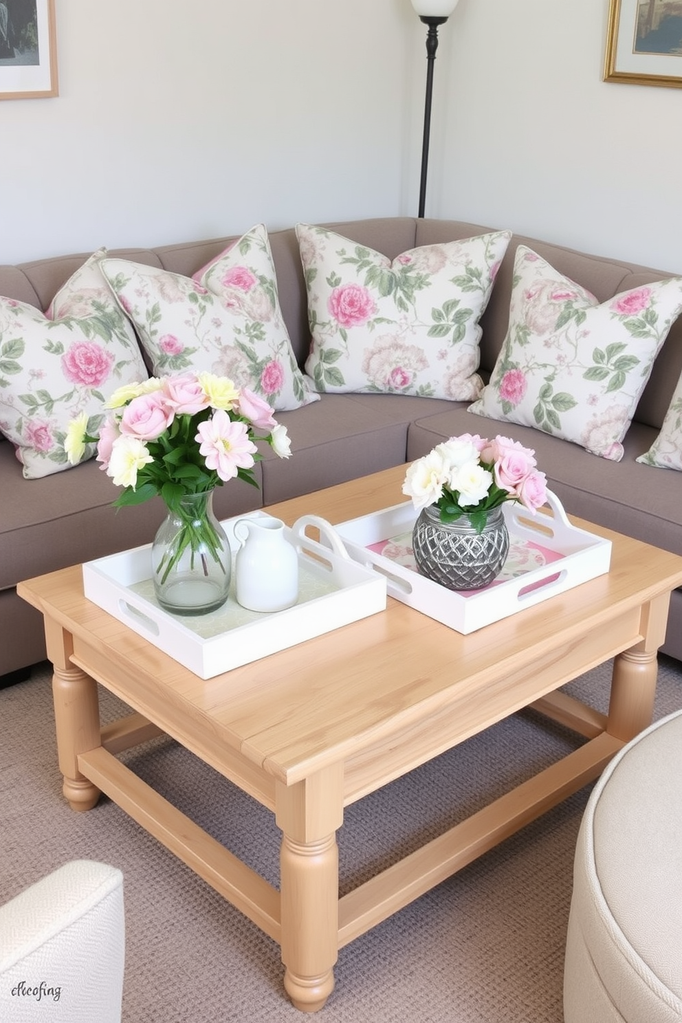 A charming small space decorated for spring. Decorative trays are used to organize items on a light wooden coffee table, enhancing both functionality and style. Fresh flowers in pastel colors are placed on the table, adding a vibrant touch to the room. Soft cushions in floral patterns are arranged on a cozy sofa, creating an inviting atmosphere.