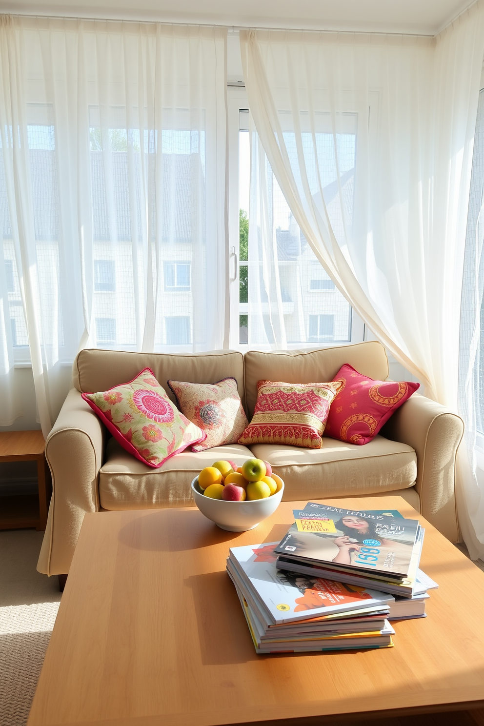 A bright and airy summer apartment setting. The space features lightweight linen curtains that gently flutter with the breeze, allowing natural light to fill the room. A cozy seating area includes a plush sofa adorned with vibrant throw pillows. A wooden coffee table sits in front, topped with a bowl of fresh fruit and a stack of colorful magazines.