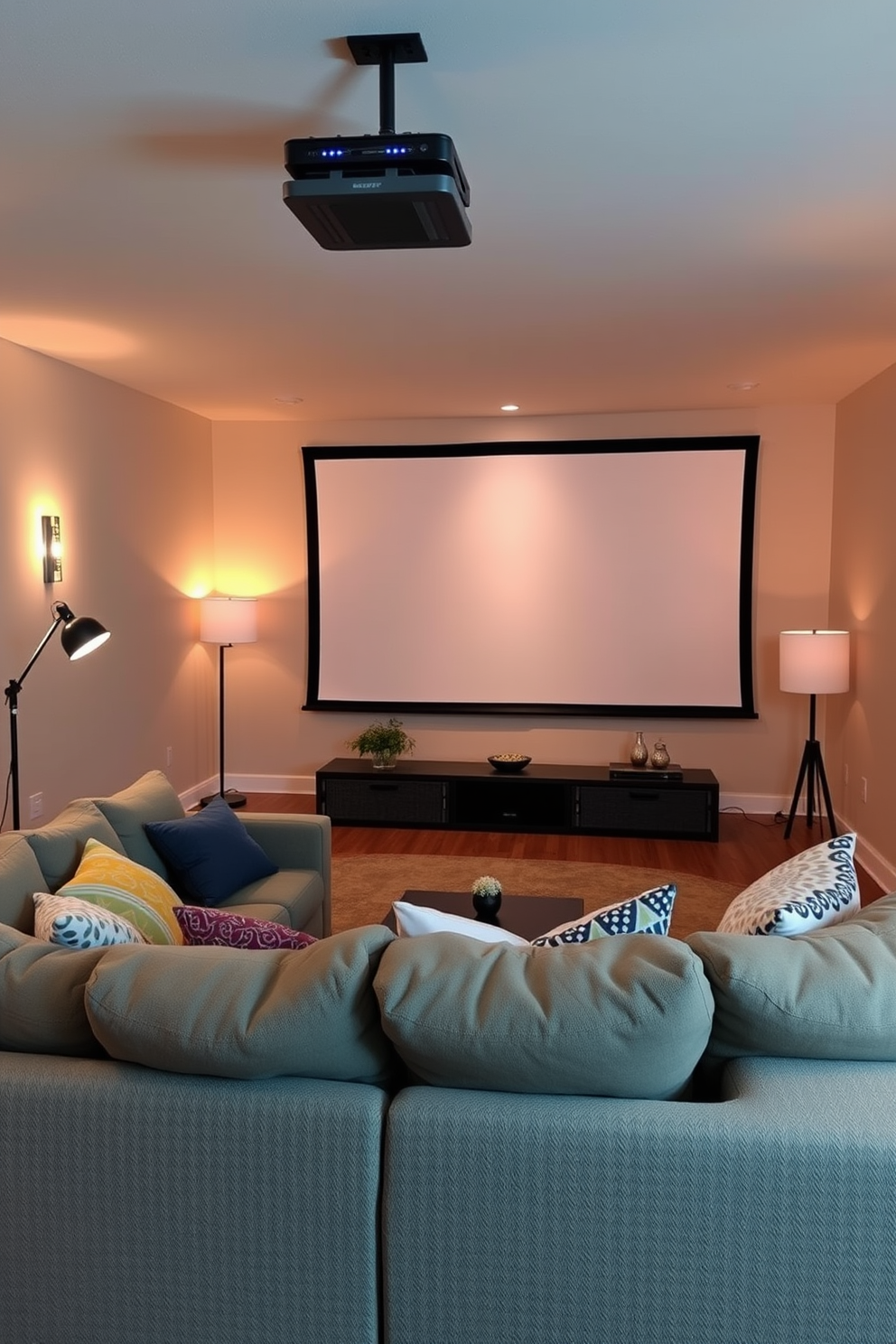 A cozy summer basement setup designed for movie nights. The walls are painted in a soft beige, and a large projector screen is mounted on the ceiling for an immersive viewing experience. Plush seating options include a sectional sofa adorned with colorful throw pillows. Ambient lighting is provided by stylish floor lamps and string lights, creating a warm and inviting atmosphere.