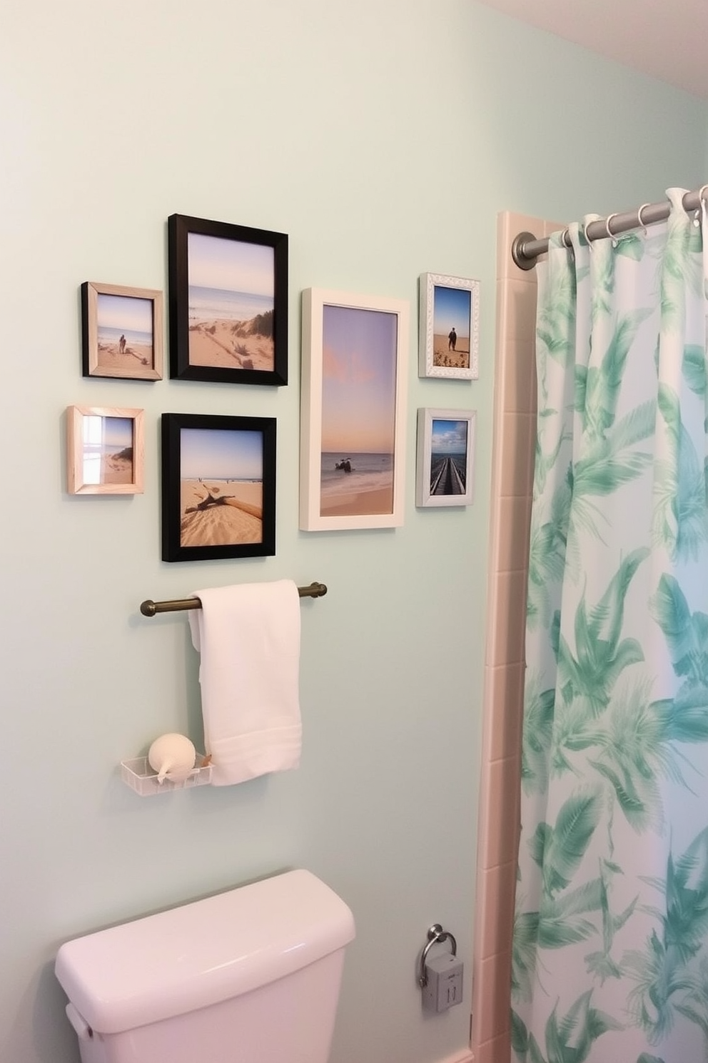 Create a gallery wall featuring a collection of beach photos in various frames. The wall is painted in a soft pastel color to enhance the coastal vibe and create a serene atmosphere. Incorporate decorative elements such as seashells and driftwood to complement the beach theme. A light and airy shower curtain with a tropical print adds a fresh touch to the overall decor.