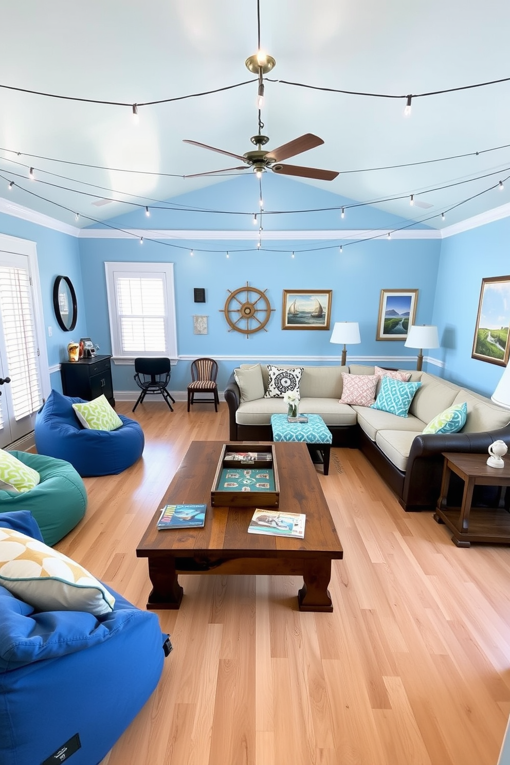 A vibrant summer game room filled with light and energy. The walls are painted in a soft blue hue, reminiscent of the ocean, and the flooring features light hardwood for a warm touch. Cozy seating areas are arranged with comfortable bean bags and a large sectional sofa adorned with colorful throw pillows. Nautical-inspired accessories, such as a ship wheel and framed ocean prints, add character to the space. A rustic wooden coffee table sits at the center, surrounded by board games and magazines for entertainment. String lights hang overhead, creating a relaxed atmosphere perfect for summer gatherings.