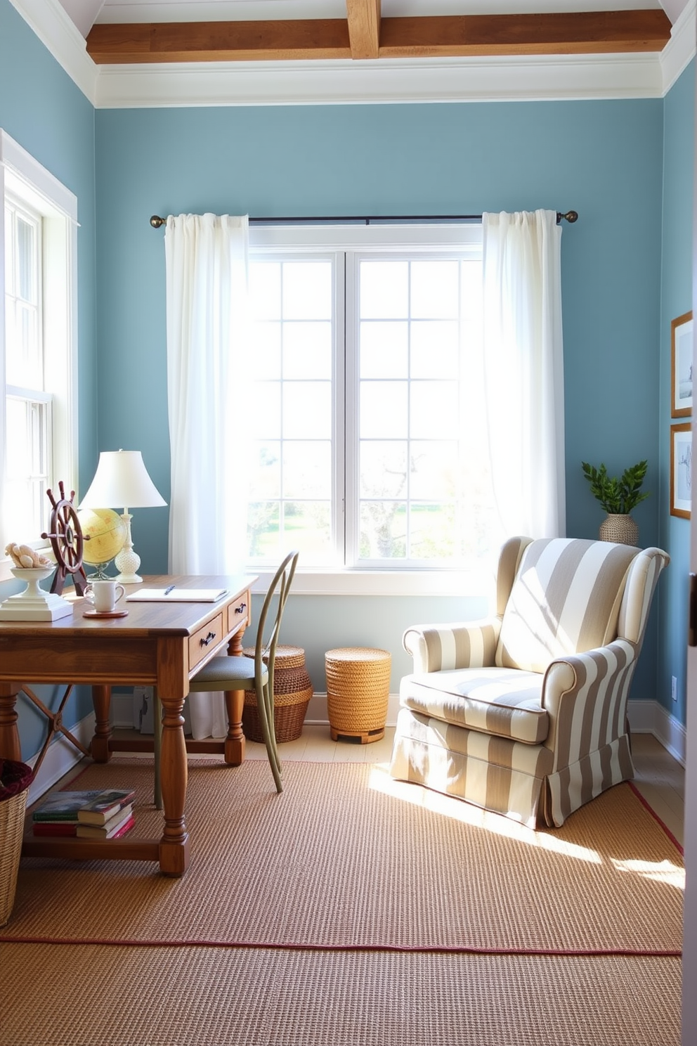 A bright and airy summer home office features a large window with sheer white curtains allowing natural light to flood the space. The walls are painted in a soft blue hue, complemented by a wooden desk with a weathered finish and nautical-themed accessories like a ship wheel and a globe. Cozy seating is provided by a comfortable armchair upholstered in a striped fabric reminiscent of beach cabanas. A jute rug anchors the room, while decorative items such as seashells and framed coastal art add a touch of charm and inspiration to the workspace.