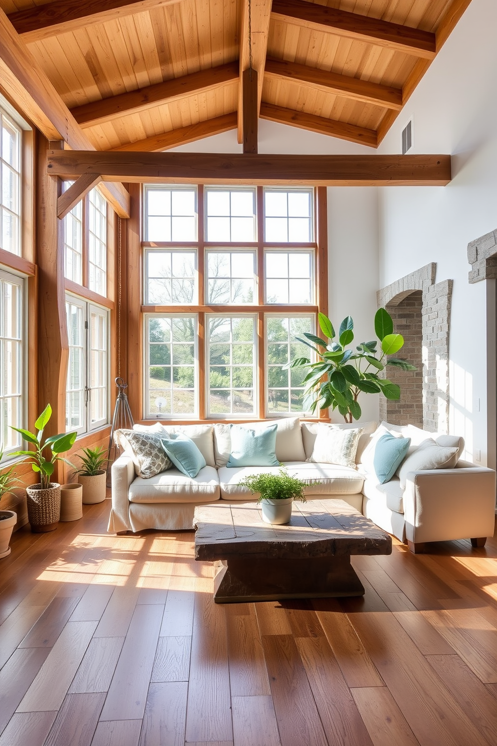 A bright and airy summer loft space featuring exposed wooden beams and large windows that let in plenty of natural light. The floor is made of reclaimed wood, and the walls are adorned with natural stone accents, creating a warm and inviting atmosphere. The furnishings include a comfortable linen sofa paired with a rustic coffee table made from reclaimed wood. Soft, textured throw pillows in light pastel colors add a touch of summer charm, while potted plants bring a refreshing touch of greenery to the space.