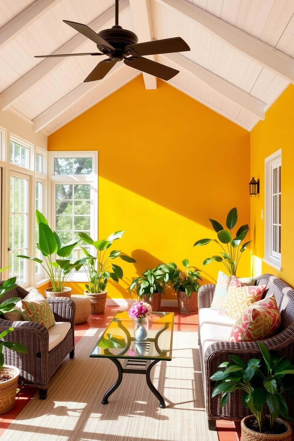 A bright and airy sunroom filled with natural light. The focal point is a bold accent wall painted in a vibrant sunny yellow, enhancing the cheerful atmosphere. Comfortable wicker furniture is arranged around a glass coffee table, adorned with colorful throw pillows. Lush green plants are placed in various corners, adding a fresh touch to the space.