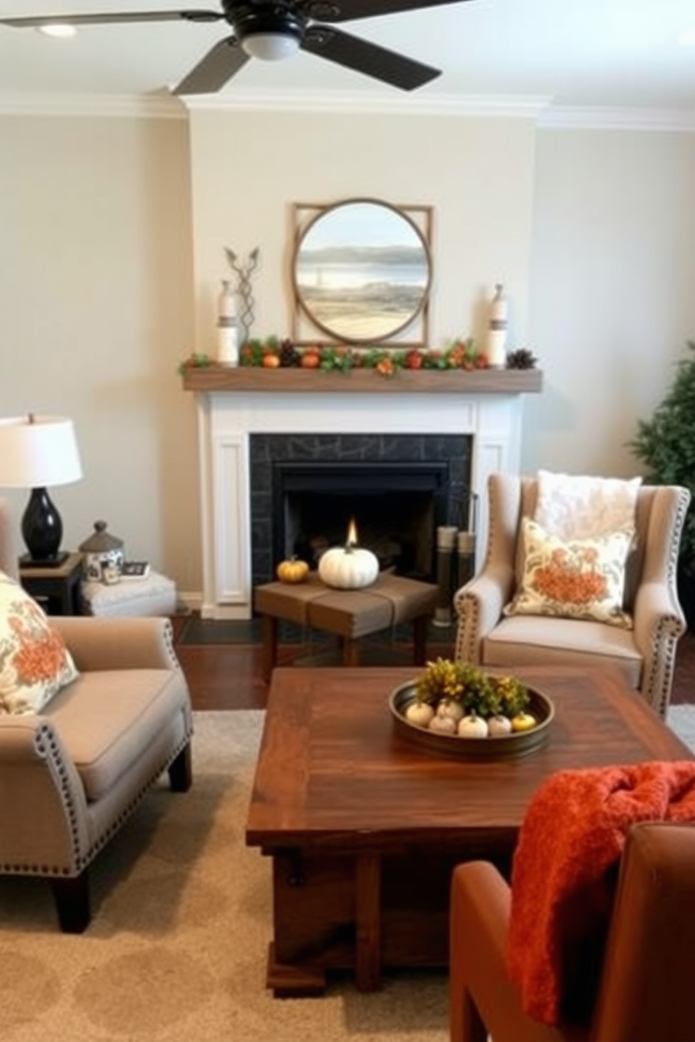 A cozy living room setting featuring accent chairs adorned with seasonal throw pillows in warm autumn hues. The chairs are positioned around a rustic wooden coffee table, with a backdrop of soft, neutral-colored walls and a fireplace decorated for Thanksgiving.