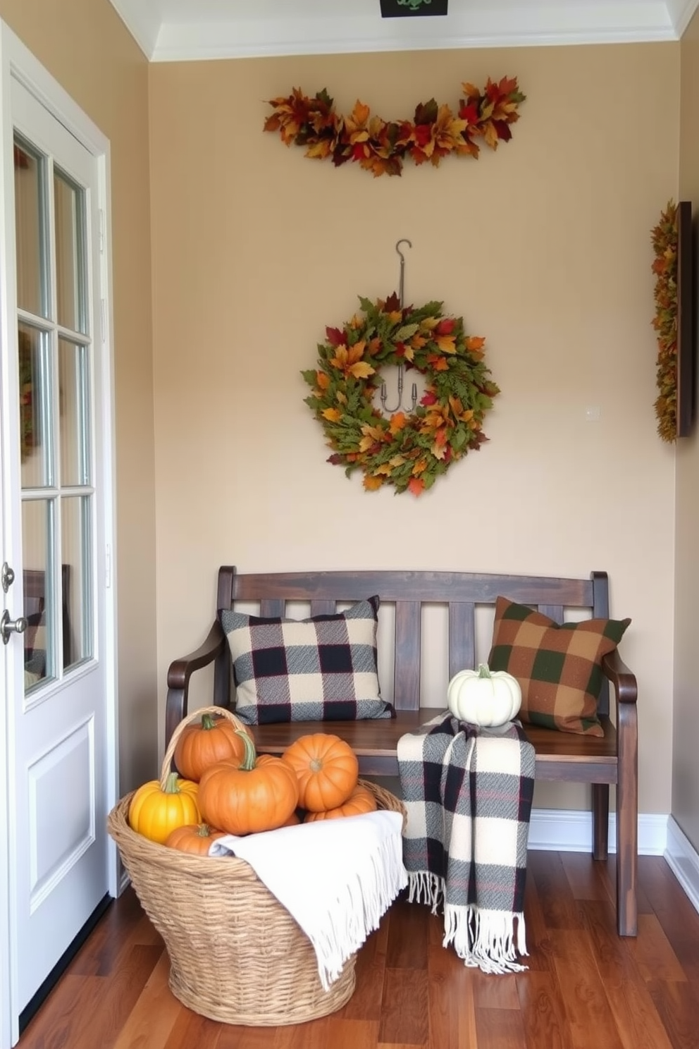 Inviting entryway adorned with fall decor featuring a rustic wooden bench and a large woven basket filled with colorful pumpkins. The walls are painted in a warm beige tone, and a cozy plaid throw blanket drapes over the bench, while a garland of autumn leaves hangs above the doorway.