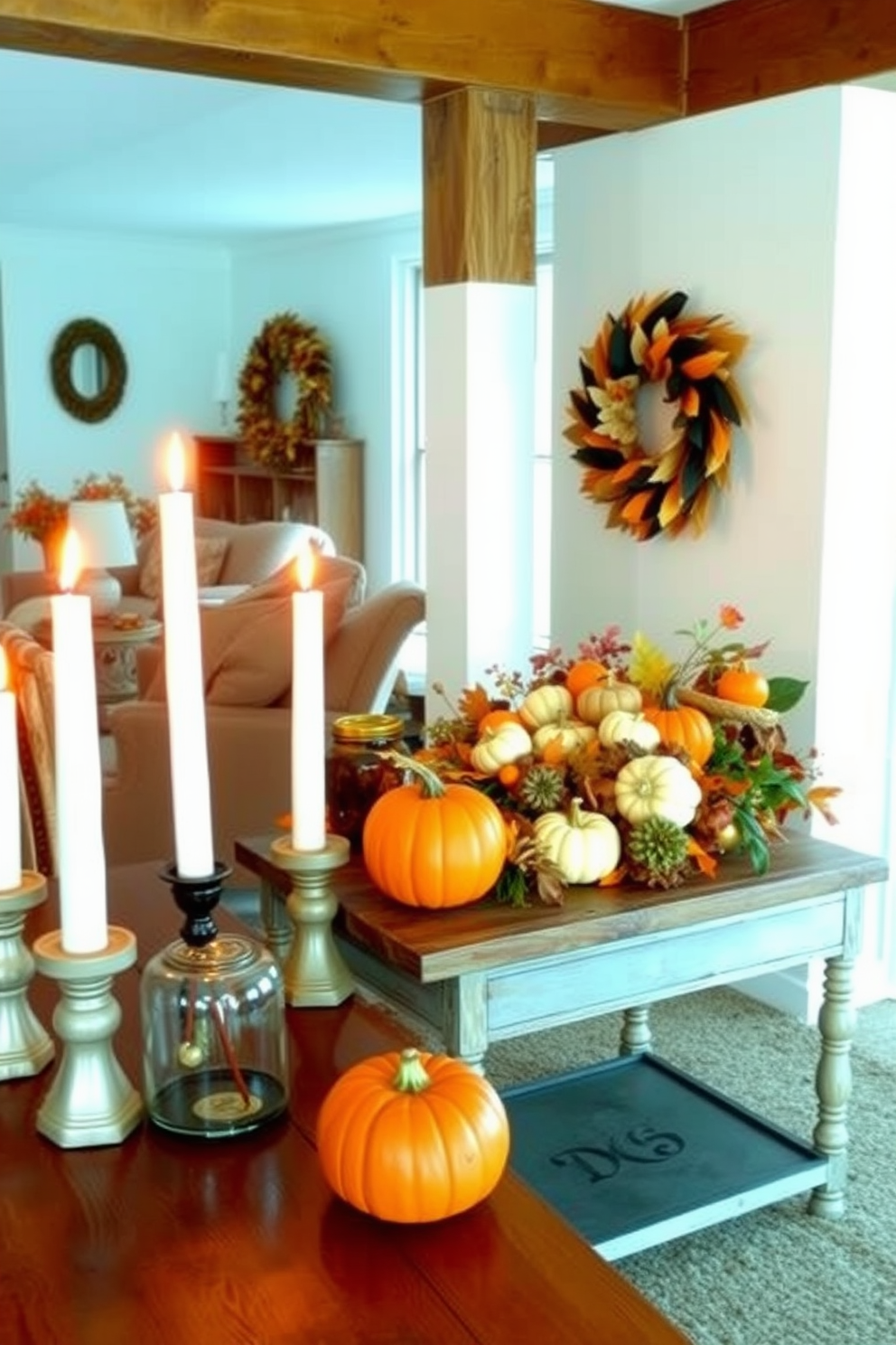 Candles in decorative holders are arranged on a rustic wooden table, casting a warm glow throughout the space. The holders are made of various materials, including glass and metal, creating an eclectic yet cohesive look. Thanksgiving decorations adorn the basement, featuring autumnal colors and natural elements. A large centerpiece made of pumpkins, gourds, and seasonal foliage sits prominently on a side table, enhancing the festive atmosphere.