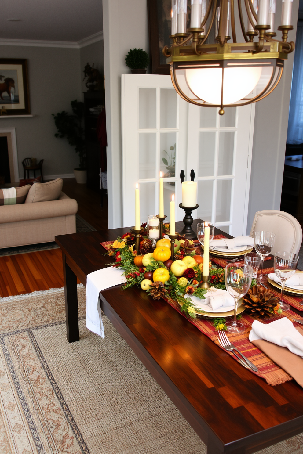 Layered rugs in a cozy living room create an inviting atmosphere. The base rug is a large neutral-toned piece, while a smaller, patterned rug adds texture and color on top. Thanksgiving decorations adorn the dining table, featuring a rustic centerpiece with seasonal fruits and candles. Elegant tableware complements the warm autumn hues of the decor, creating a festive yet sophisticated setting.