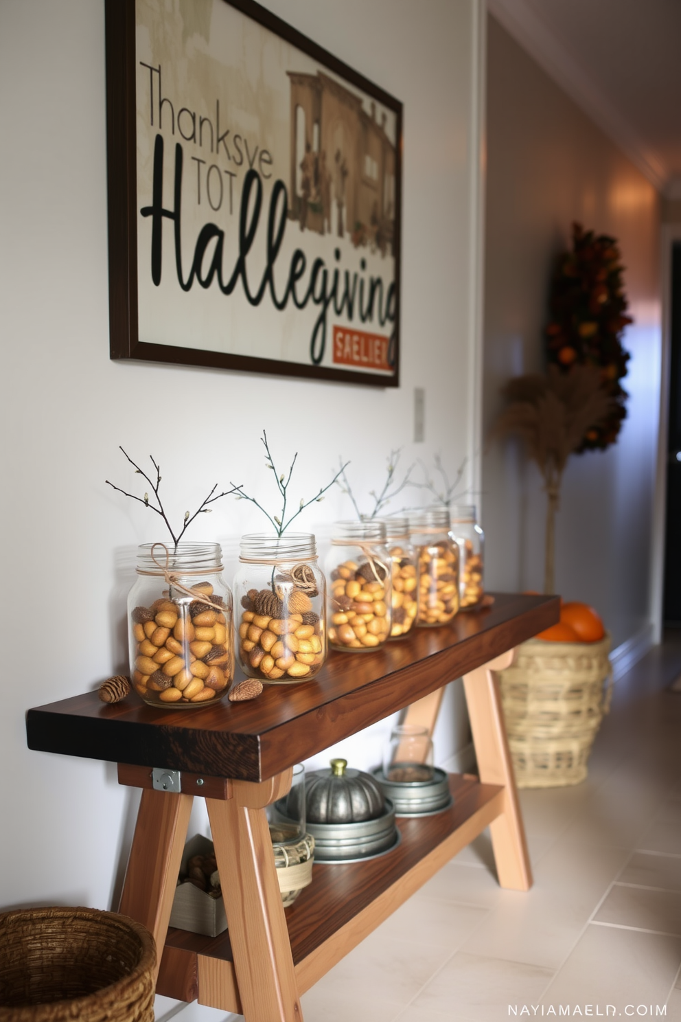 A cozy hallway adorned for Thanksgiving features mason jars filled with acorns and pinecones arranged on a rustic wooden console table. Soft, warm lighting illuminates the space, enhancing the autumnal colors of the decorations and creating an inviting atmosphere.