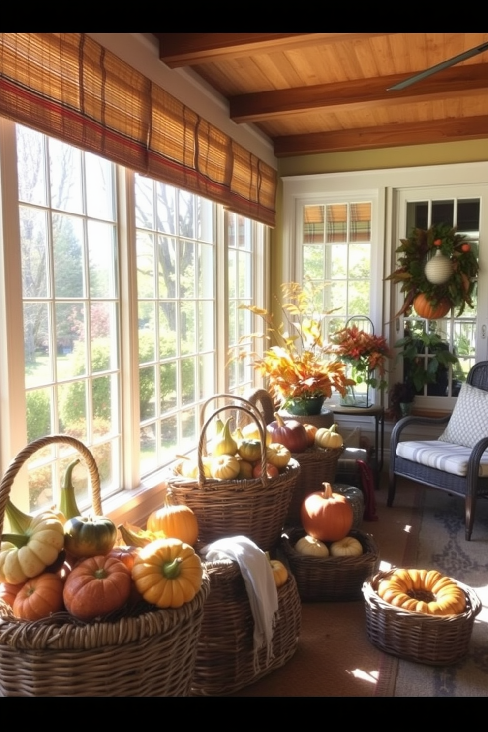 A cozy sunroom adorned for Thanksgiving features woven baskets filled with colorful gourds in various sizes. The sunlight streams through large windows, illuminating the warm tones of the natural materials and creating a welcoming atmosphere.