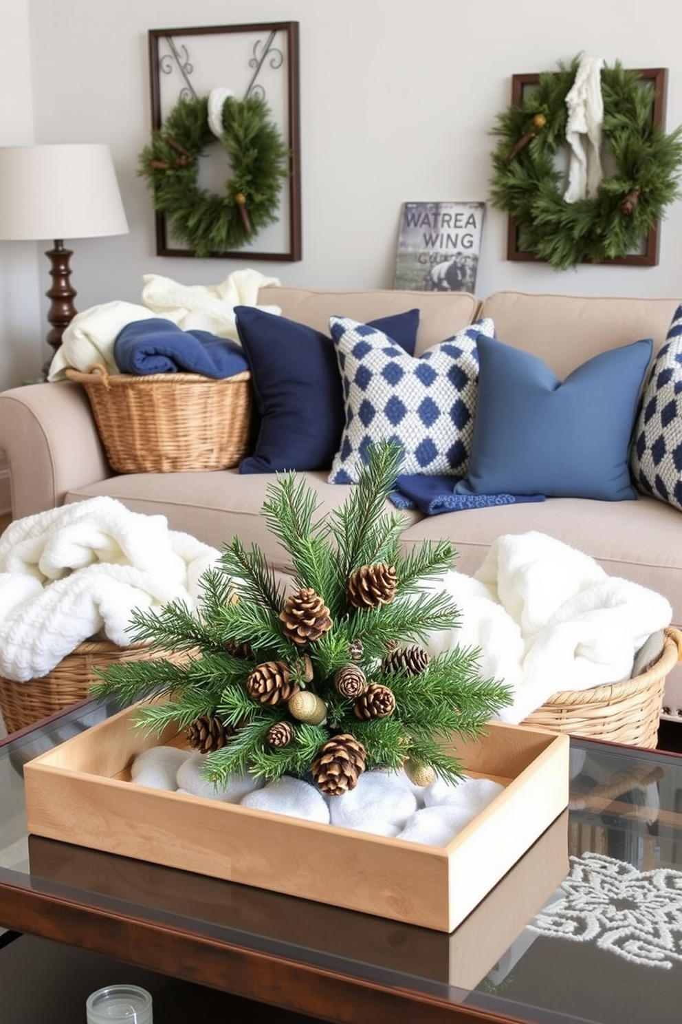 A cozy living room adorned with decorative baskets filled with soft, warm blankets. The baskets are made of natural fibers and are strategically placed near a plush sofa, enhancing the inviting atmosphere of the space. Winter-themed decor accents the room, featuring a color palette of deep blues and soft whites. A beautifully arranged display of pinecones and evergreen branches adds a seasonal touch to the coffee table, creating a festive yet sophisticated vibe.