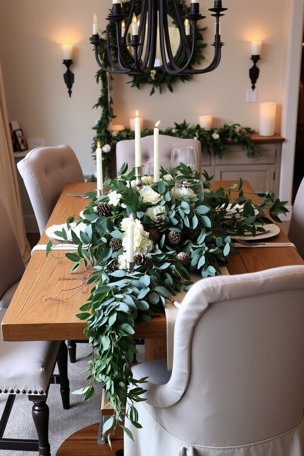 A cozy winter dining room adorned with eucalyptus garlands draped elegantly across the table. The setting features a rustic wooden table surrounded by plush upholstered chairs, with soft candlelight creating a warm ambiance. The centerpiece showcases a lush arrangement of eucalyptus leaves interspersed with white flowers and pinecones. Soft, neutral table linens complement the decor, enhancing the inviting atmosphere of the space.