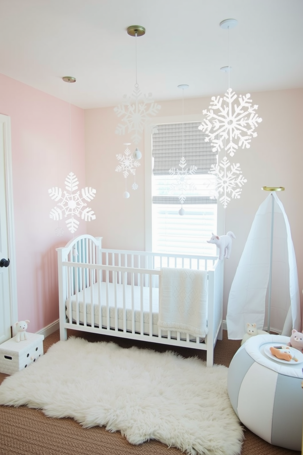 Create a cozy winter nursery featuring snowflake mobiles hanging from the ceiling to add a whimsical charm. The walls are painted in soft pastel colors, and a plush white rug covers the floor, providing a warm and inviting atmosphere.