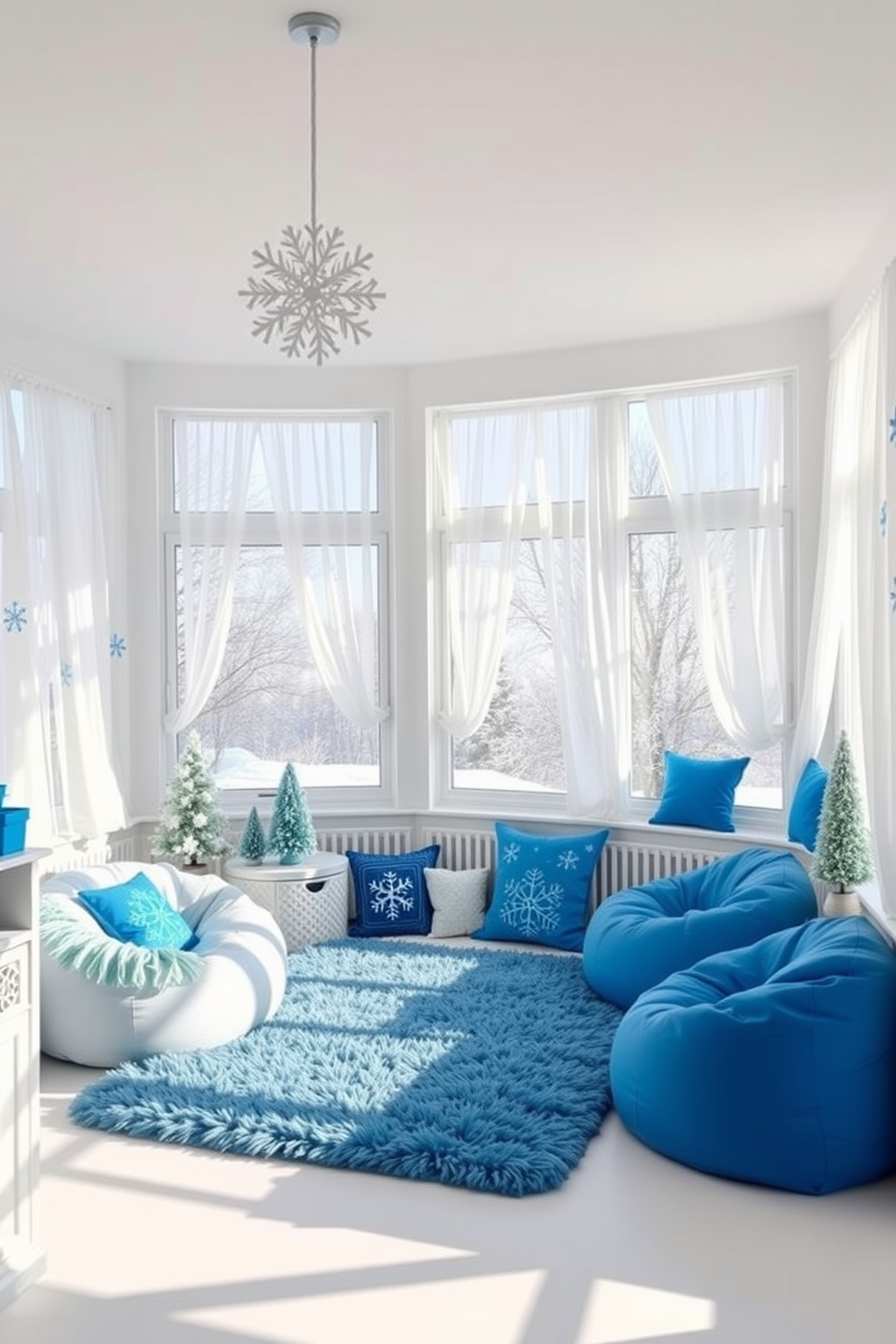 A cozy winter playroom designed with a white and blue color palette. The walls are painted in a soft white, while the furniture features vibrant blue accents, including a plush rug and bean bags for seating. Large windows allow natural light to flood the space, adorned with sheer white curtains that flutter gently in the breeze. A collection of winter-themed decorations, such as snowflake decals and blue cushions, create a playful and inviting atmosphere.