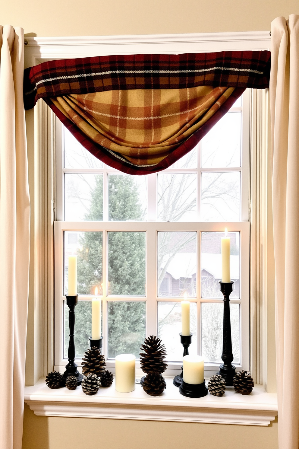 A cozy winter window setting. The window is adorned with a warm plaid scarf valance that gently drapes over the top, adding a touch of seasonal charm. Soft, sheer curtains frame the sides, allowing natural light to filter in while maintaining privacy. On the windowsill, a collection of pinecones and candles in varying heights create a rustic yet inviting atmosphere.